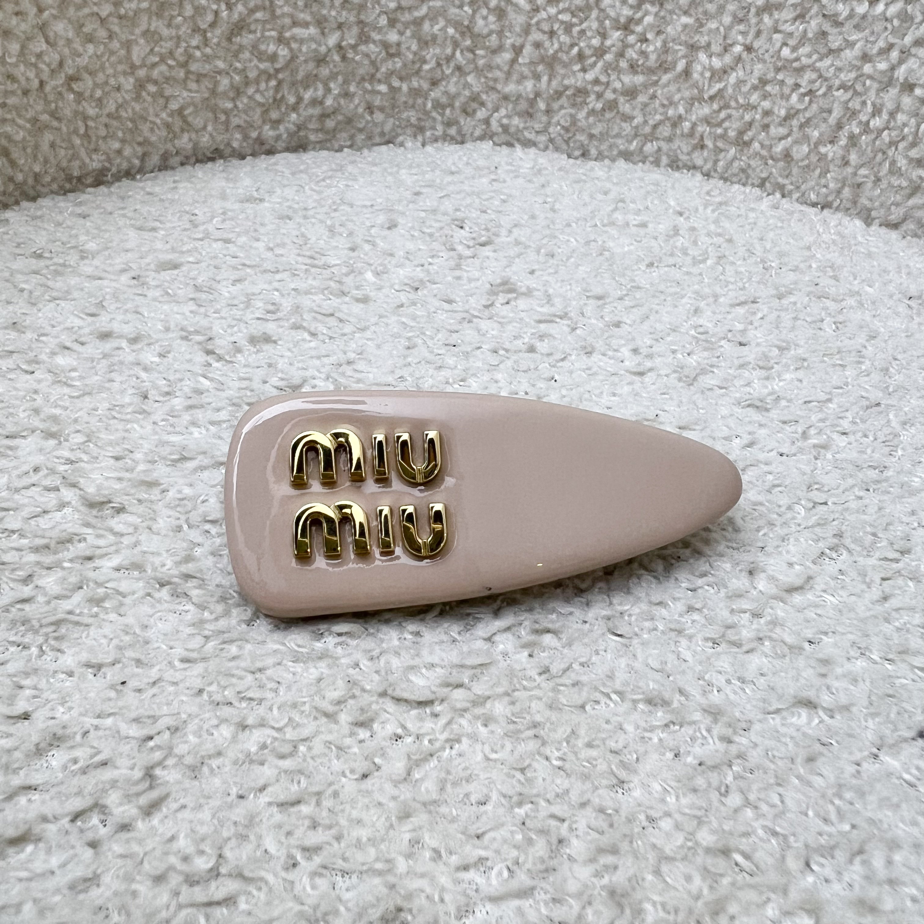 Miu Miu Gold Logo Hair Clip in Nude Beige Patent Leather  display picture 2