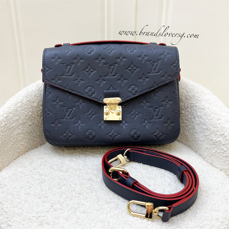 Pochette Metis Empreinte Blue GHW