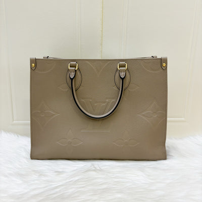 LV Onthego MM in Tourterelle Empreinte Leather and GHW