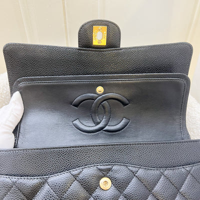 Chanel Medium Classic Flap CF in Black Caviar and 24K GHW