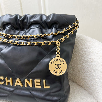 Chanel 22 Mini Hobo Handbag in Black Shiny Calfskin and AGHW