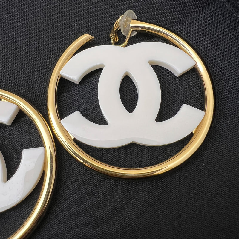 Chanel 24S Large CC Logo Hoop Clip-on Earrings with White Enamel in GHW