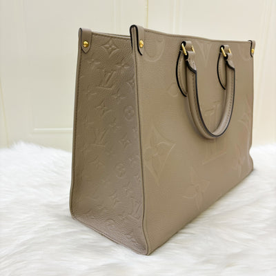 LV Onthego MM in Tourterelle Empreinte Leather and GHW