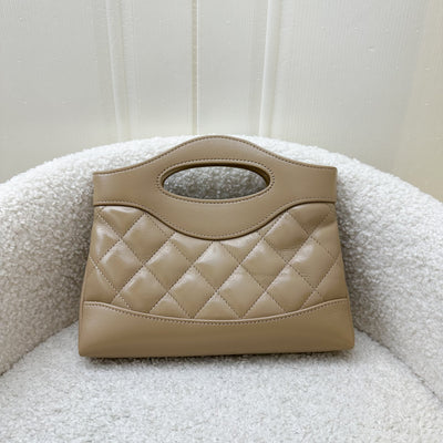 Chanel Nano 31 Clutch with Chain in 24S Beige Lambskin and LGHW