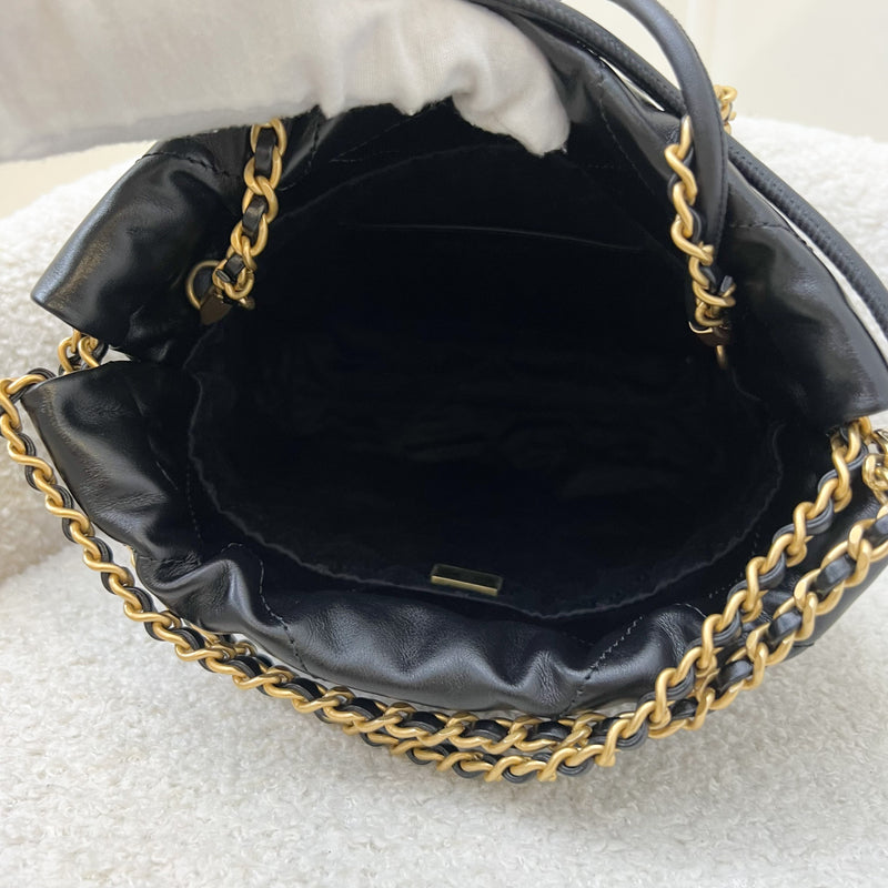 Chanel 22 Mini Hobo Handbag in Black Shiny Calfskin and AGHW