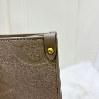 LV Onthego MM in Tourterelle Empreinte Leather and GHW