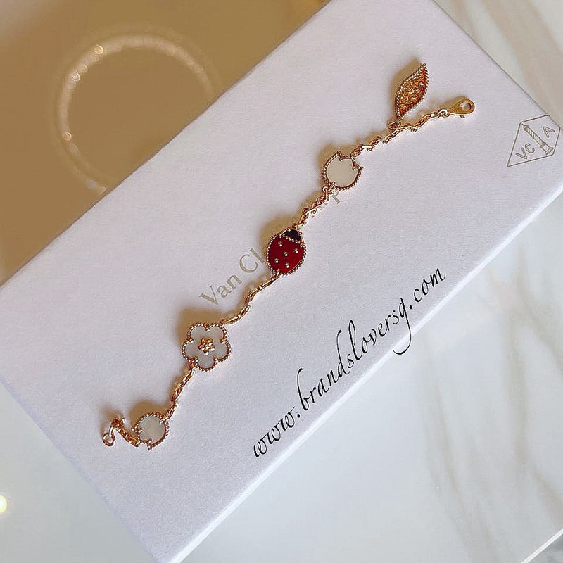 Van Cleef & Arpels VCA Lucky Spring 5 Motif Bracelet with Carnelian, Onyx and Mother of Pearl in 18K Rose Gold (Ref: VCARP7RR00)