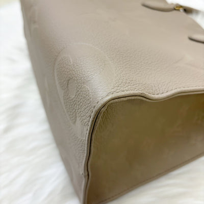 LV Onthego MM in Tourterelle Empreinte Leather and GHW