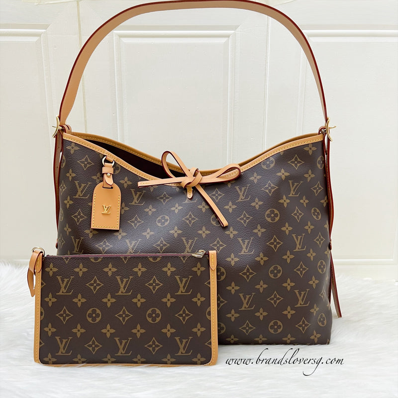 LV Carryall MM Hobo Bag in Monogram Canvas and GHW