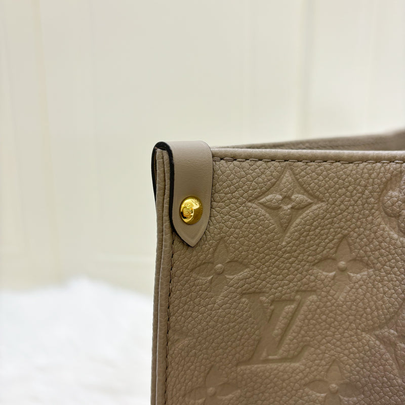 LV Onthego MM in Tourterelle Empreinte Leather and GHW