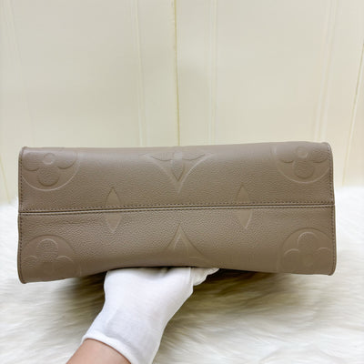 LV Onthego MM in Tourterelle Empreinte Leather and GHW