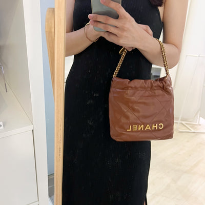 Chanel 22 Mini Hobo Handbag in 23A Brown Calfskin and AGHW