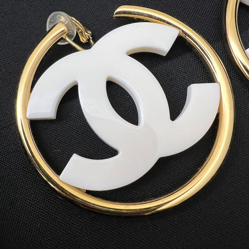 Chanel 24S Large CC Logo Hoop Clip-on Earrings with White Enamel in GHW