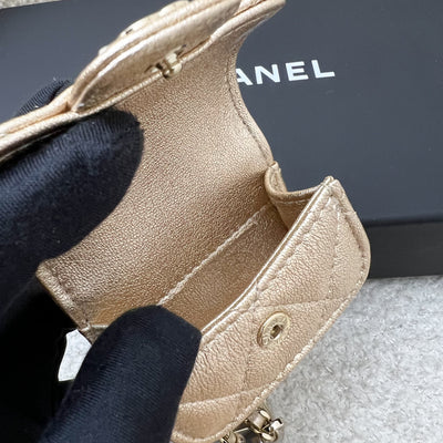 Chanel 2024 VIP Gift Round Pouch and Airpods Holder Bag Charm in Metallic Gold Lambskin and LGHW