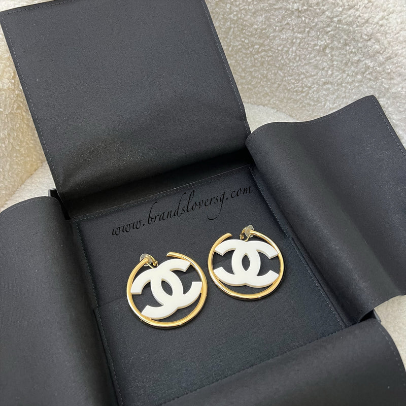 Chanel 24S Large CC Logo Hoop Clip-on Earrings with White Enamel in GHW