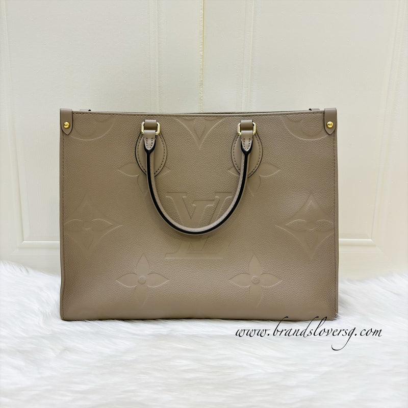 LV Onthego MM in Tourterelle Empreinte Leather and GHW