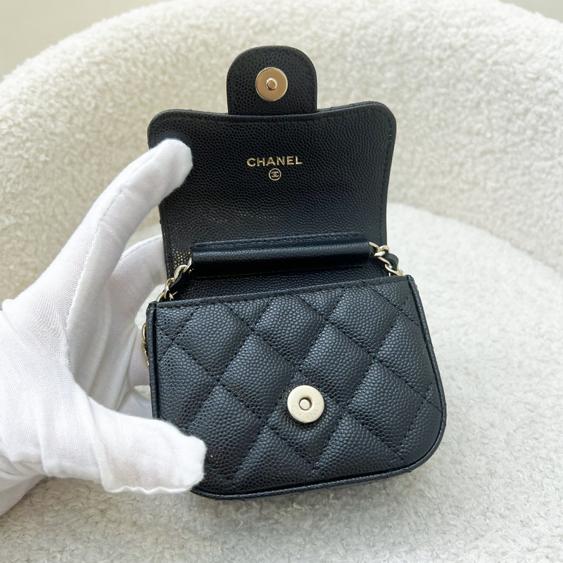 Chanel Micro Flap Bag / Clutch on Chain in Black Caviar in LGHW