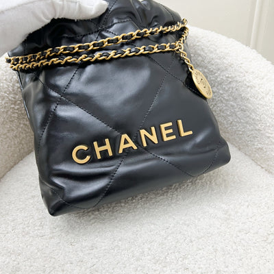 Chanel 22 Mini Hobo Handbag in Black Shiny Calfskin and AGHW