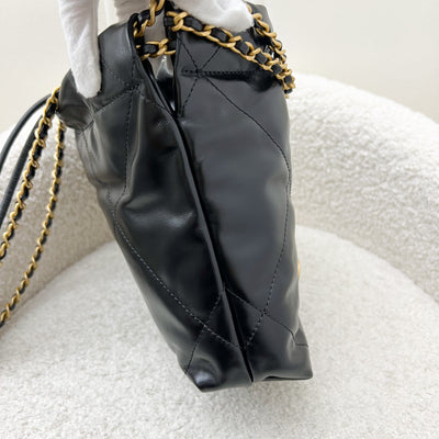 Chanel 22 Mini Hobo Handbag in Black Shiny Calfskin and AGHW