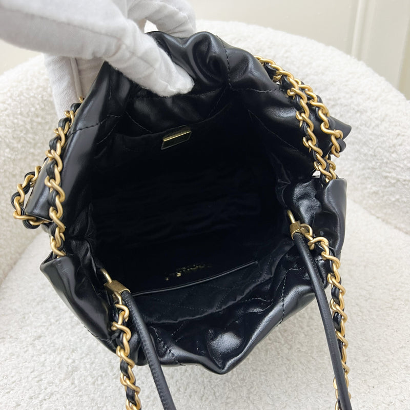 Chanel 22 Mini Hobo Handbag in Black Shiny Calfskin and AGHW