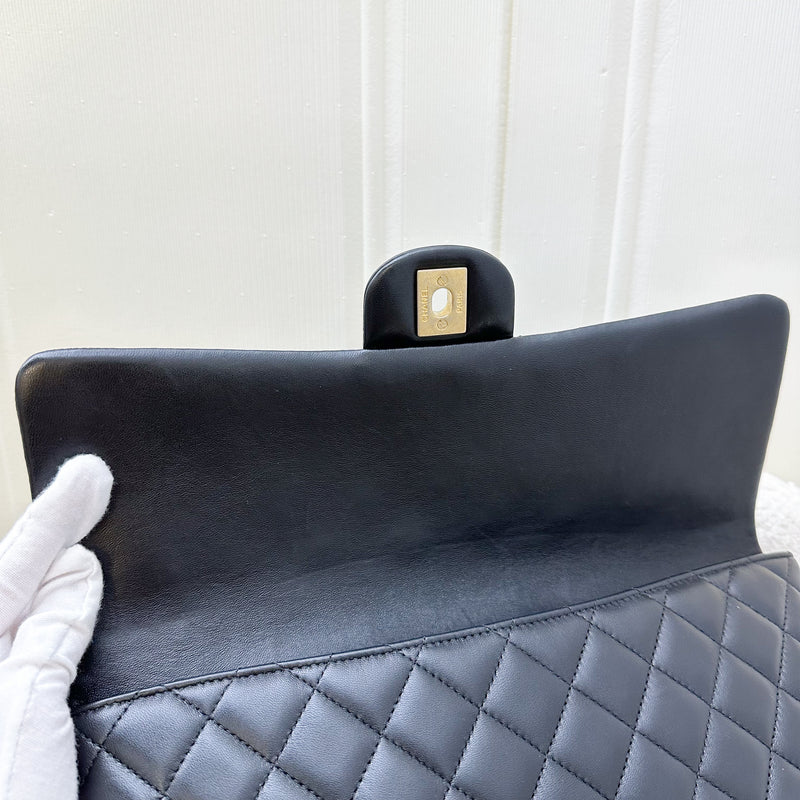 Chanel Classic Clutch in Black Lambskin and AGHW