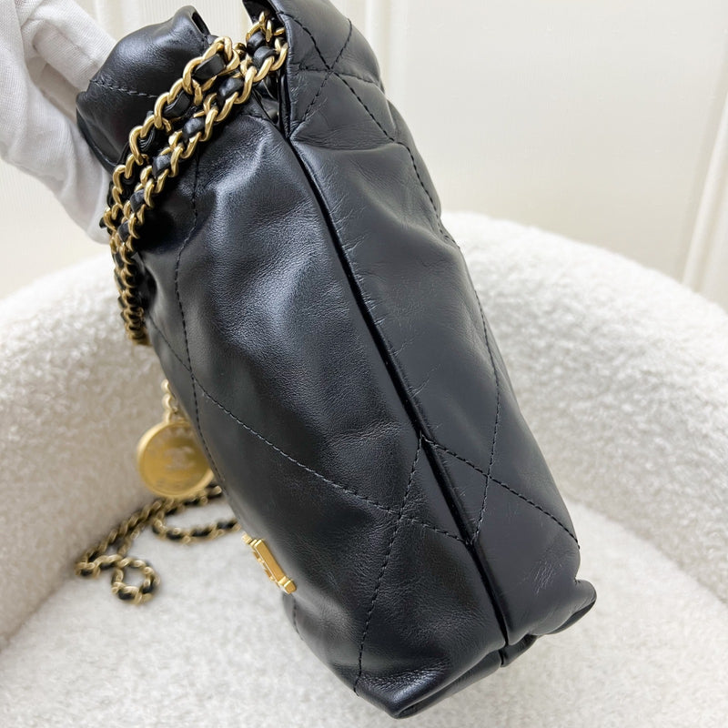 Chanel 22 Mini Hobo Handbag in Black Shiny Calfskin and AGHW