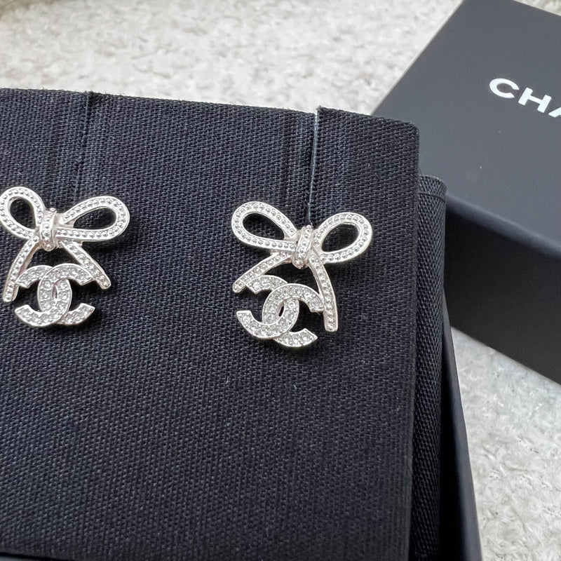 Chanel 25K Bow and Logo Earrings in SHW (Model: ABG601)