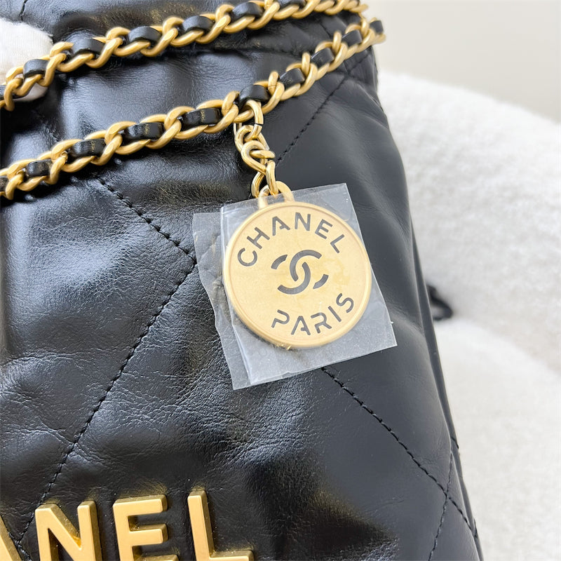 Chanel 22 Mini Hobo Handbag in Black Shiny Calfskin and AGHW