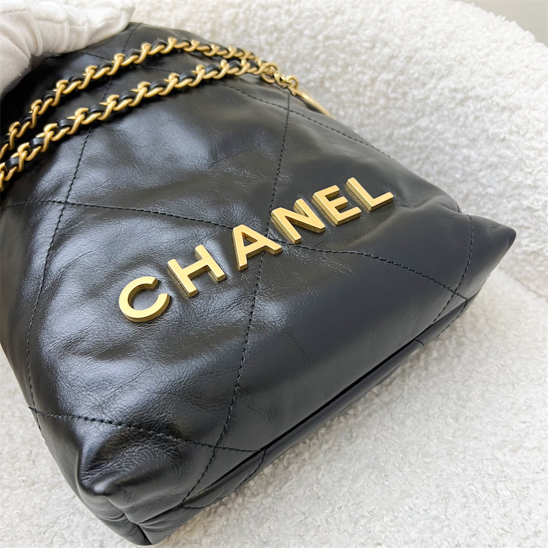 Chanel 22 Mini Hobo Handbag in Black Shiny Calfskin and AGHW