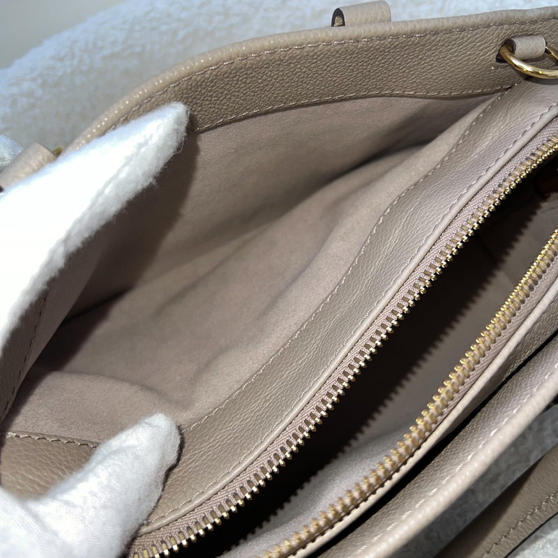 LV Onthego East West in Tourterelle (Grey) / Creme Giant Monogram Empreinte Leather and GHW (Model: M23641)