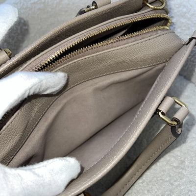 LV Onthego East West in Tourterelle (Grey) / Creme Giant Monogram Empreinte Leather and GHW (Model: M23641)