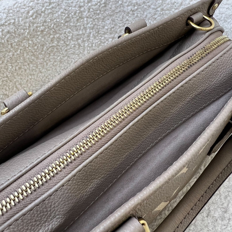 LV Onthego East West in Tourterelle (Grey) / Creme Giant Monogram Empreinte Leather and GHW (Model: M23641)
