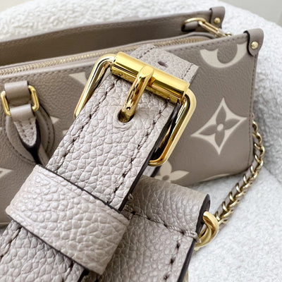 LV Onthego East West in Tourterelle (Grey) / Creme Giant Monogram Empreinte Leather and GHW (Model: M23641)