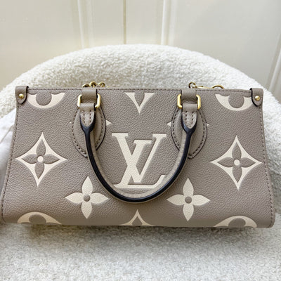 LV Onthego East West in Tourterelle (Grey) / Creme Giant Monogram Empreinte Leather and GHW (Model: M23641)