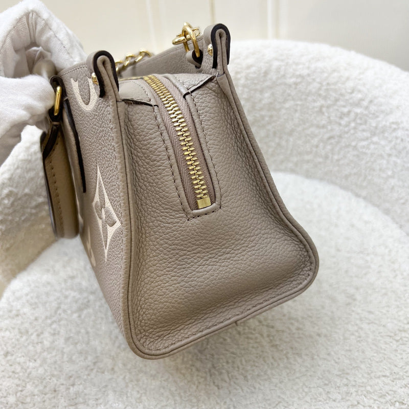LV Onthego East West in Tourterelle (Grey) / Creme Giant Monogram Empreinte Leather and GHW (Model: M23641)