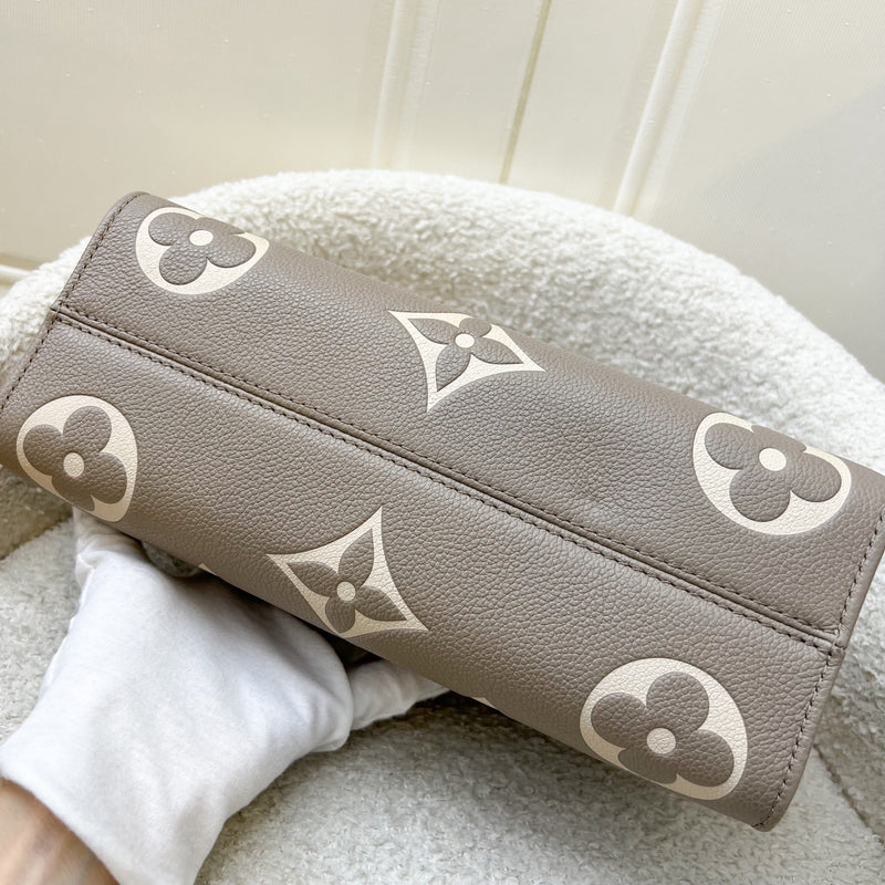 LV Onthego East West in Tourterelle (Grey) / Creme Giant Monogram Empreinte Leather and GHW (Model: M23641)