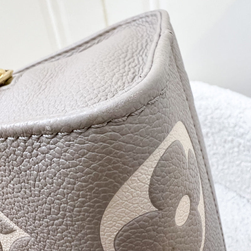 LV Onthego East West in Tourterelle (Grey) / Creme Giant Monogram Empreinte Leather and GHW (Model: M23641)