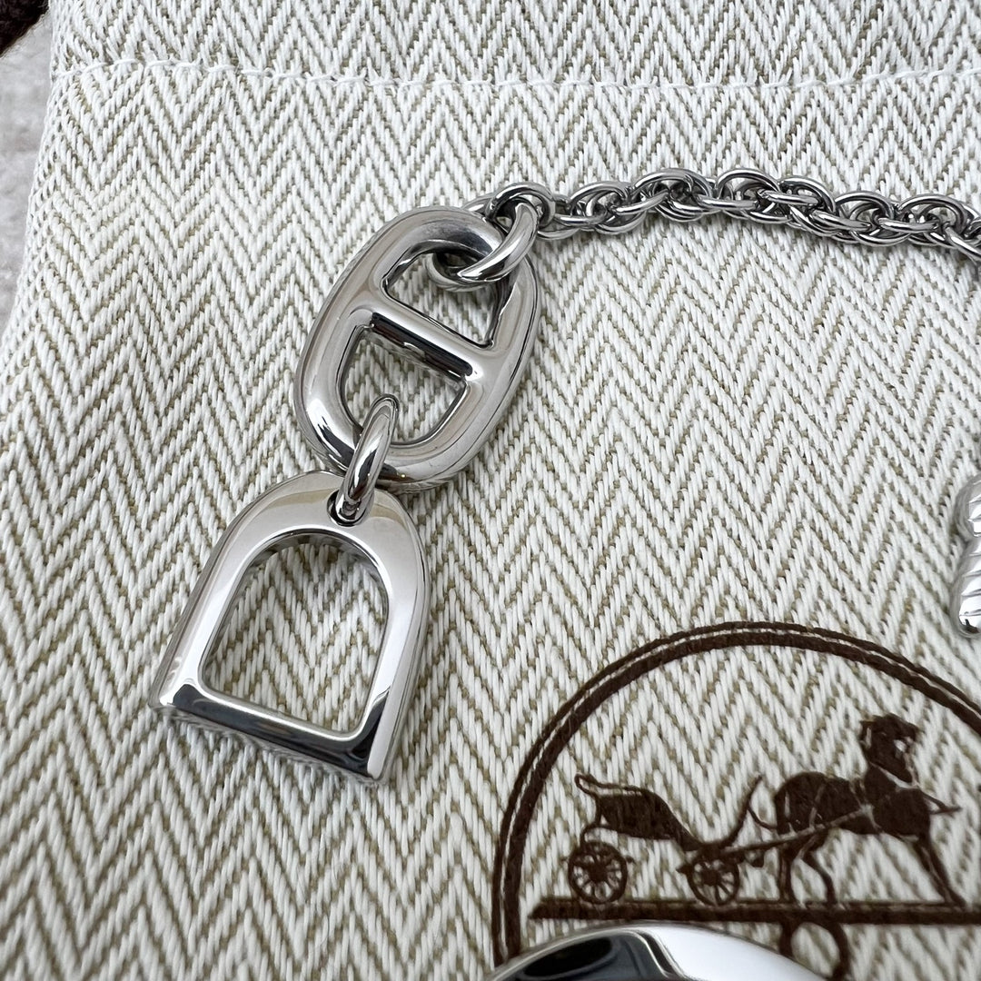 送料込【HERMES】ボンボヤージュ キーリング ステンレススチール Hermes Bon Voyage Key Ring in Stainless Steel – Brands Lover