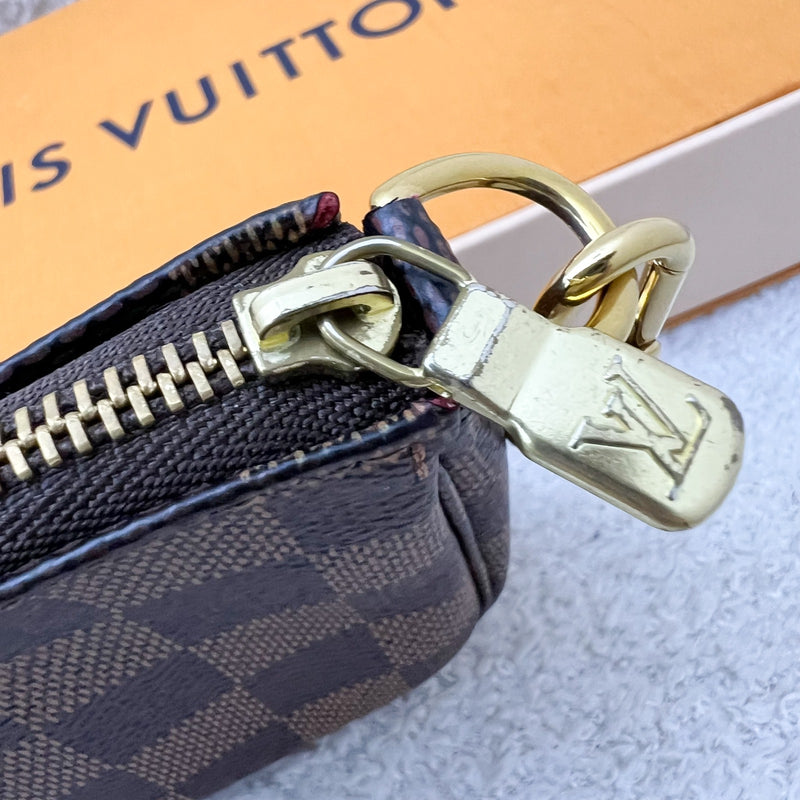 LV Mini Pochette Accessoires in Damier Ebene Canvas GHW