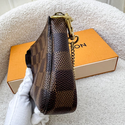 LV Mini Pochette Accessoires in Damier Ebene Canvas GHW