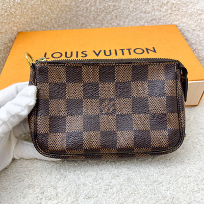 LV Mini Pochette Accessoires in Damier Ebene Canvas GHW