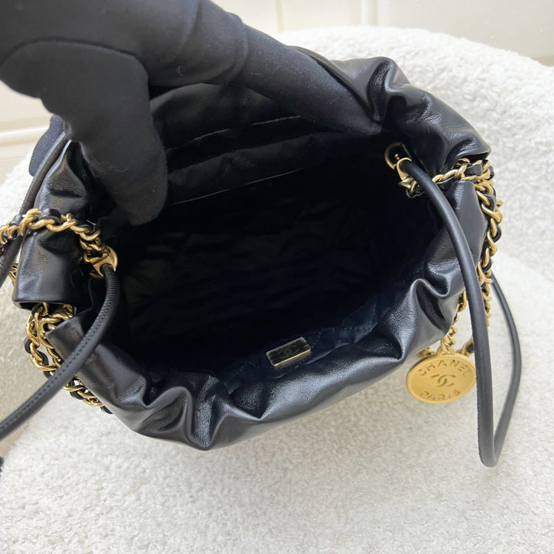 Chanel 22 Mini Hobo Handbag in 24S Striped Black and White Shiny Calfskin and AGHW (Detachable Strap)