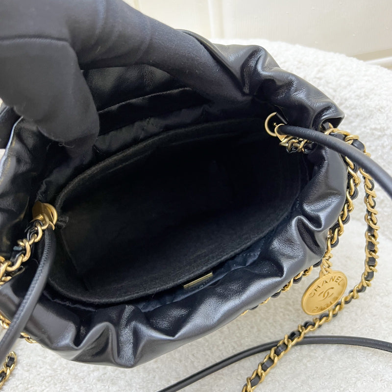 Chanel 22 Mini Hobo Handbag in 24S Striped Black and White Shiny Calfskin and AGHW (Detachable Strap)