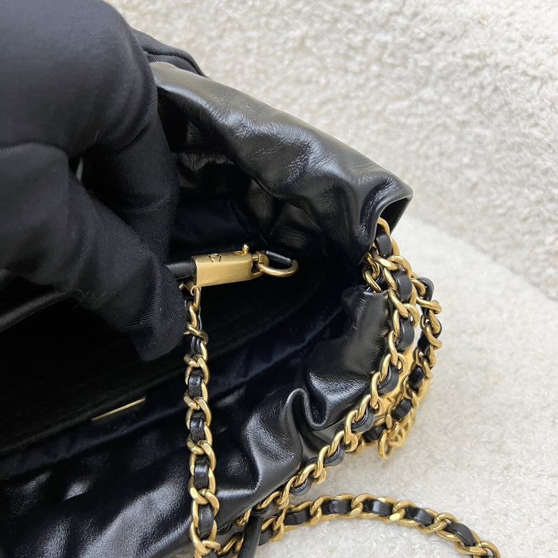 Chanel 22 Mini Hobo Handbag in 24S Striped Black and White Shiny Calfskin and AGHW (Detachable Strap)