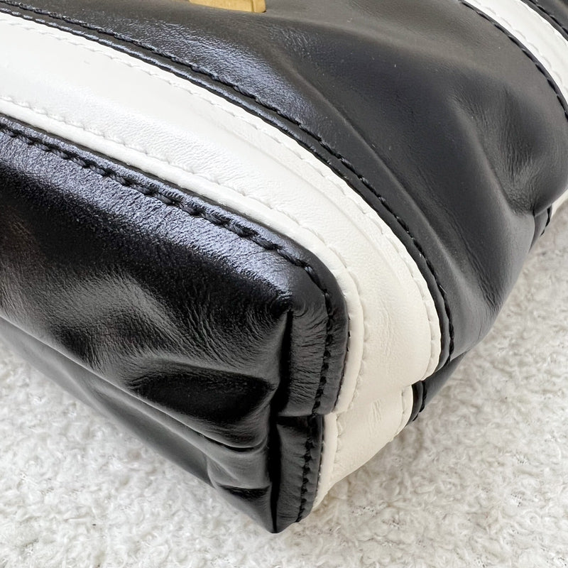 Chanel 22 Mini Hobo Handbag in 24S Striped Black and White Shiny Calfskin and AGHW (Detachable Strap)