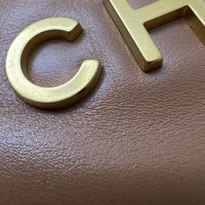 Chanel 22 Small Hobo Handbag in 23C Caramel Shiny Calfskin and AGHW