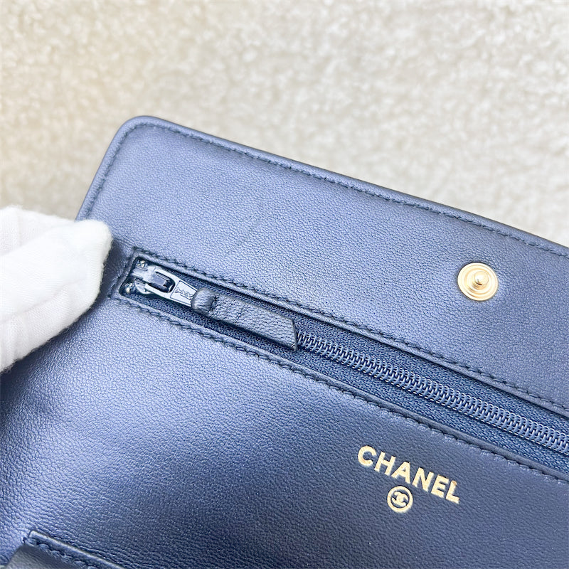 Chanel Wallet on Chain WOC in Camellia Embossed Midnight Blue Lambskin and AGHW