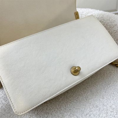 Chanel Medium 25cm Boy Flap in Ivory White Caviar AGHW