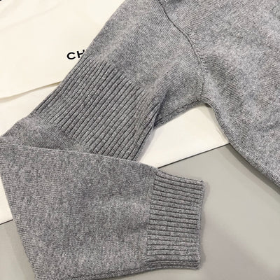 Chanel 24B Knitted Pullover with CC Logo Turnlocks in Grey Cashmere (Model: P77869)