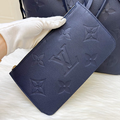 LV Neverfull MM Tote in Navy Giant Monogram Empreinte Leather and GHW (With Attached Pouch)